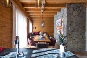 Posezení v ubytování Alpe Chalets Goldener Hirsch