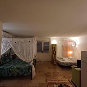 Krevet ili kreveti u jedinici u okviru objekta Ti coin de paradis Ylang Ylang