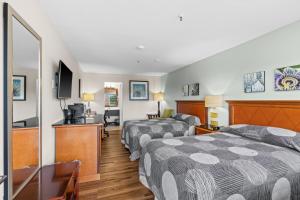 Postel nebo postele na pokoji v ubytování Basecamp Puyallup a Travelodge by Wyndham
