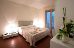 Posteľ alebo postele v izbe v ubytovaní Lacroma Aparthotel