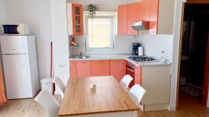 Kuchyňa alebo kuchynka v ubytovaní Cvita Apartment