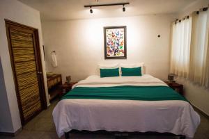 Postel nebo postele na pokoji v ubytování Hotel Tequila Cancun