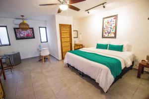 Postel nebo postele na pokoji v ubytování Hotel Tequila Cancun