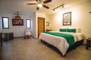 Postel nebo postele na pokoji v ubytování Hotel Tequila Cancun