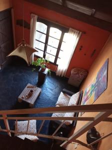 En eller flere senge i et værelse på Alquileres Viviana + 5 billeder