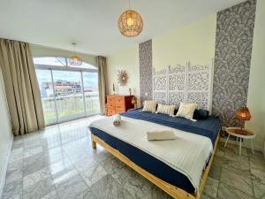 Voodi või voodid majutusasutuse TAHITI - Condo Orovini toas