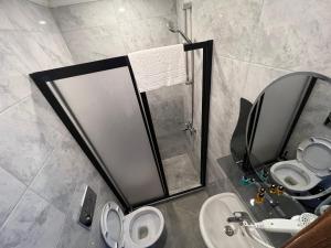 Koupelna v ubytování Hotel Arinna