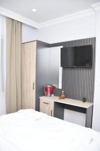 Postel nebo postele na pokoji v ubytování Hotel Arinna