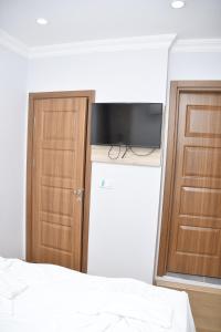 TV a/nebo společenská místnost v ubytování Hotel Arinna