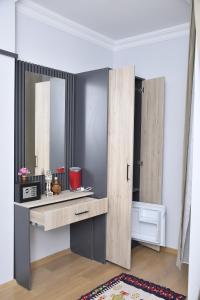 Kuchyň nebo kuchyňský kout v ubytování Hotel Arinna