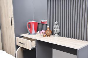 Kuchyň nebo kuchyňský kout v ubytování Hotel Arinna