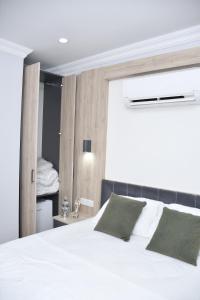 Postel nebo postele na pokoji v ubytování Hotel Arinna