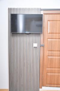 TV a/nebo společenská místnost v ubytování Hotel Arinna