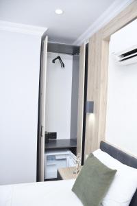 Postel nebo postele na pokoji v ubytování Hotel Arinna