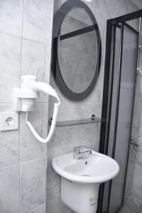 Koupelna v ubytování Hotel Arinna