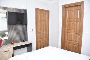Postel nebo postele na pokoji v ubytování Hotel Arinna