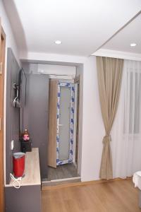 Koupelna v ubytování Hotel Arinna + 37 fotografií