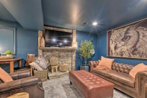 a living room with a couch and a fireplace at Pet-Friendly Home in Heart of Wine Country! in Linden