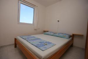 Postel nebo postele na pokoji v ubytování Apartment Mandre 6405b