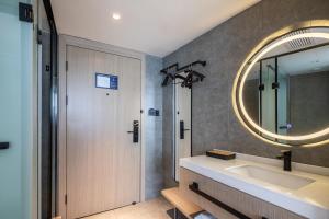 Ванна кімната в Xinhuating Business Hotel