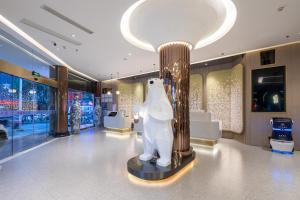 Зображення з фотогалереї помешкання Xinhuating Business Hotel у місті Lishui