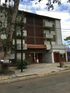 a building on the side of a street at Hernandarias 2 in San Bernardo