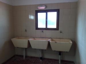two sinks in a bathroom with a window at Hernandarias 2 in San Bernardo +19 photos