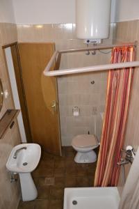 Kúpeľňa v ubytovaní Apartment Kustici 6335e