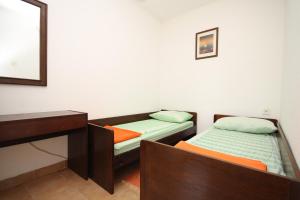 Posteľ alebo postele v izbe v ubytovaní Apartments with parking spaces Umag - 6978