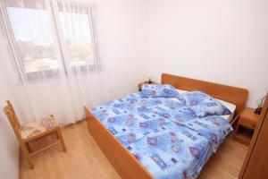 Posteľ alebo postele v izbe v ubytovaní Apartments with a parking space Umag - 7073