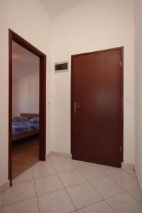 Posteľ alebo postele v izbe v ubytovaní Apartments with a parking space Umag - 7073