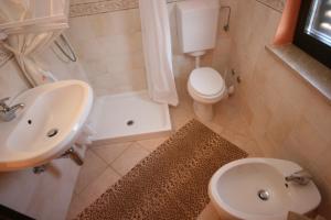 Kúpeľňa v ubytovaní Apartments by the sea Umag - 7029