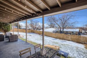 a pavilion with benches and a view of a yard at Private House Near DT Denver & Mountains, Pet Friendly, Fire Pit, Ping Pong Table, Explore or Relax at this Arvada Retreat in Arvada