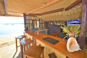 TV a/nebo společenská místnost v ubytování Concepcion Divers Lodge
