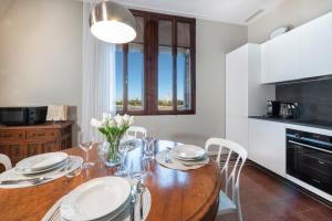 A kitchen or kitchenette at Ca' delle Contesse - Villa on lagoon with private dock and spectacular view