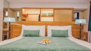Amnaya Resort Nusa Dua客房内的一张或多张床位