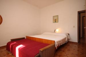 Postel nebo postele na pokoji v ubytování Apartment Basanija 7149c