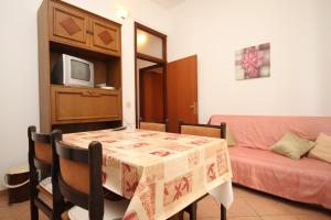 Posezení v ubytování Apartment Basanija 7149c