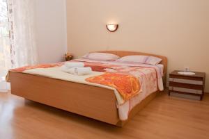 Postel nebo postele na pokoji v ubytování Apartments with a parking space Novigrad - 7108