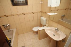 Koupelna v ubytování Apartments with a parking space Novigrad - 7108
