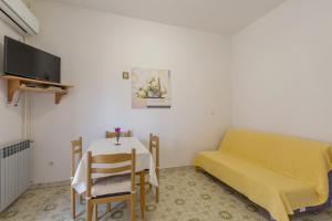 A television and/or entertainment centre at Apartments with a parking space Kukci, Porec - 7166