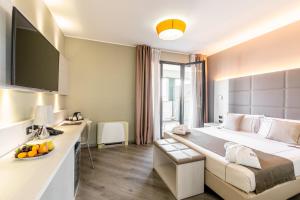 TV a/nebo společenská místnost v ubytování Acca Palace AA Hotels