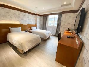 Voodi või voodid majutusasutuse The Rivero Hotel toas
