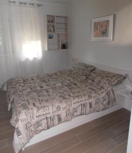 Posteľ alebo postele v izbe v ubytovaní Apartments by the sea Umag - 7189