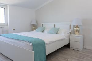 Letto o letti in una camera di The View Split. Highlight with Roof-Top-Terrace and Pool
