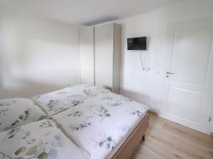 Postel nebo postele na pokoji v ubytování Beim Risei