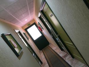A television and/or entertainment centre at Hotel Atalayas Zafra
