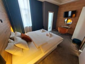 Ein Bett oder Betten in einem Zimmer der Unterkunft A8 b&b