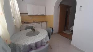 Kuchyň nebo kuchyňský kout v ubytování Apartments Kekica
