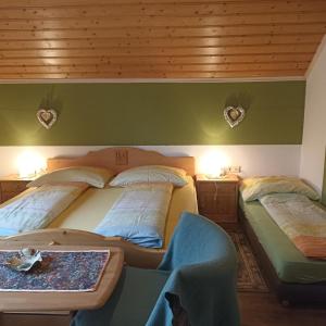 Lova arba lovos apgyvendinimo įstaigoje Ferienhaus Gstoderblick